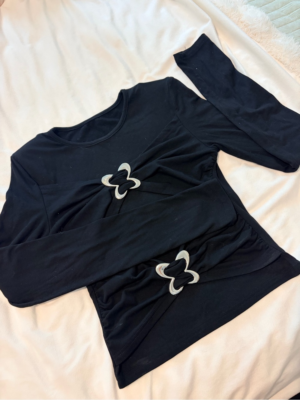 Black long sleeve top with silver details